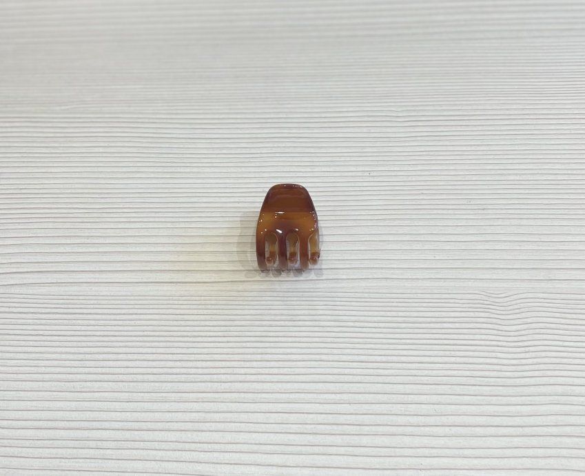 Pinza clásica pequeña caramelo